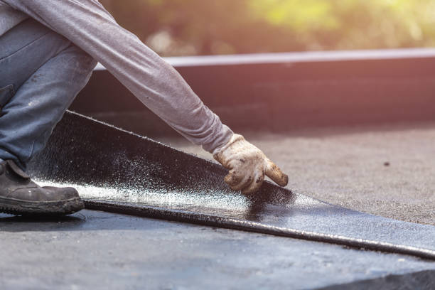 Professional Basement Waterproofing technician working in New Boston, OH